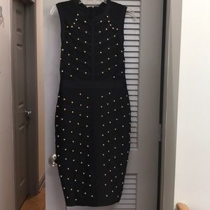 Little black dress with gold accents